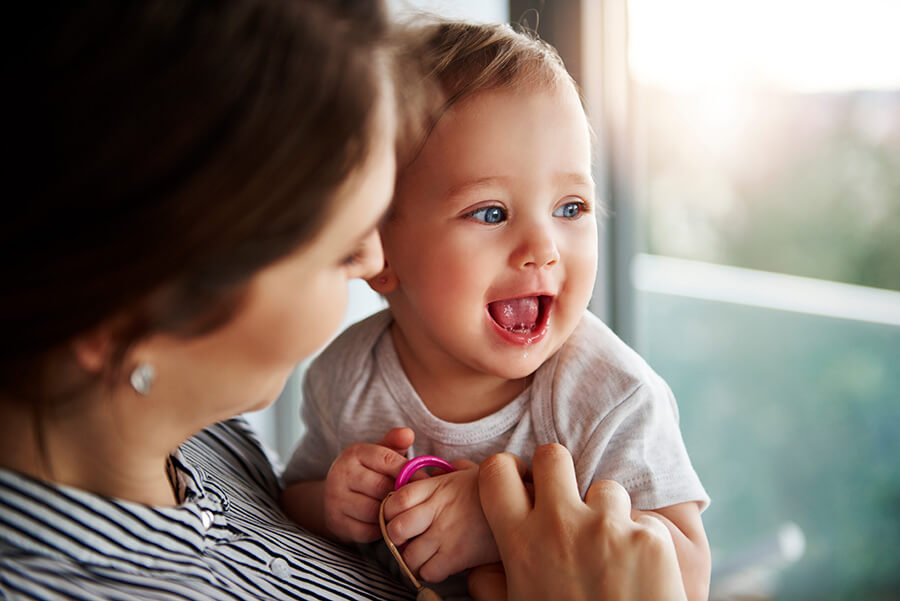 toddler looking out of window