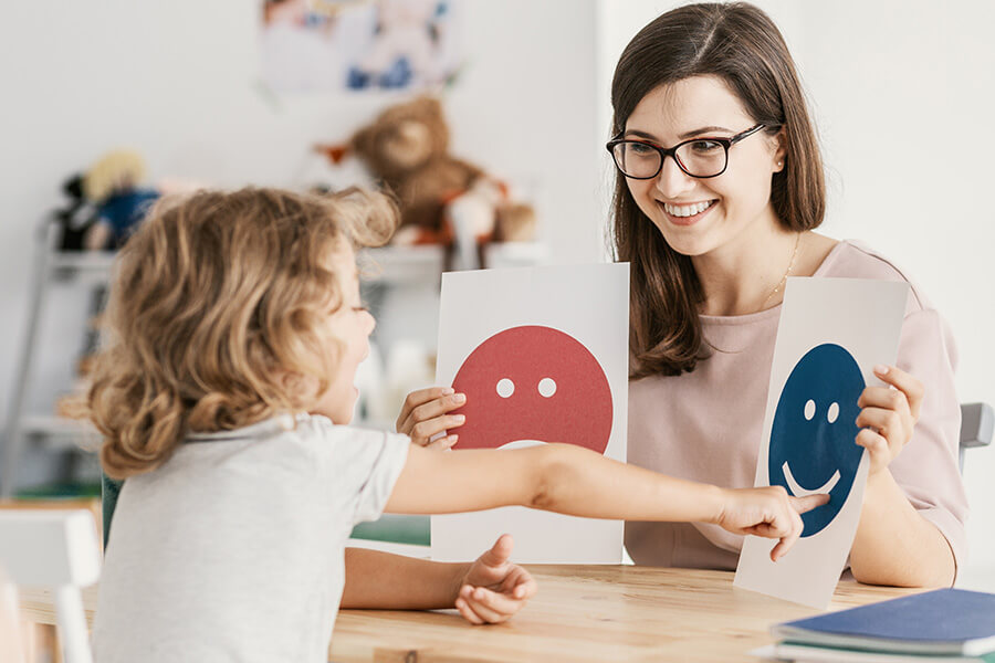 young child and teacher